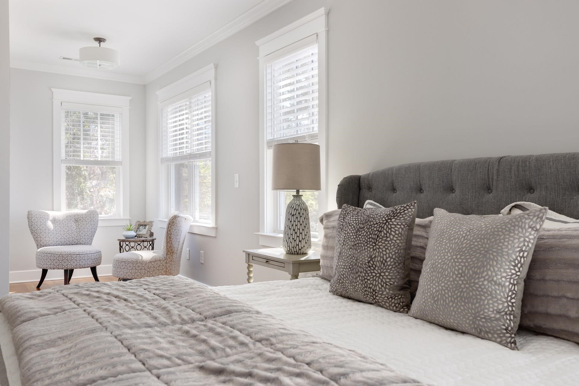 910 Sedgefield Street Durham, NC 27705 - Photo 20 of 39 a bedroom with a bed and window