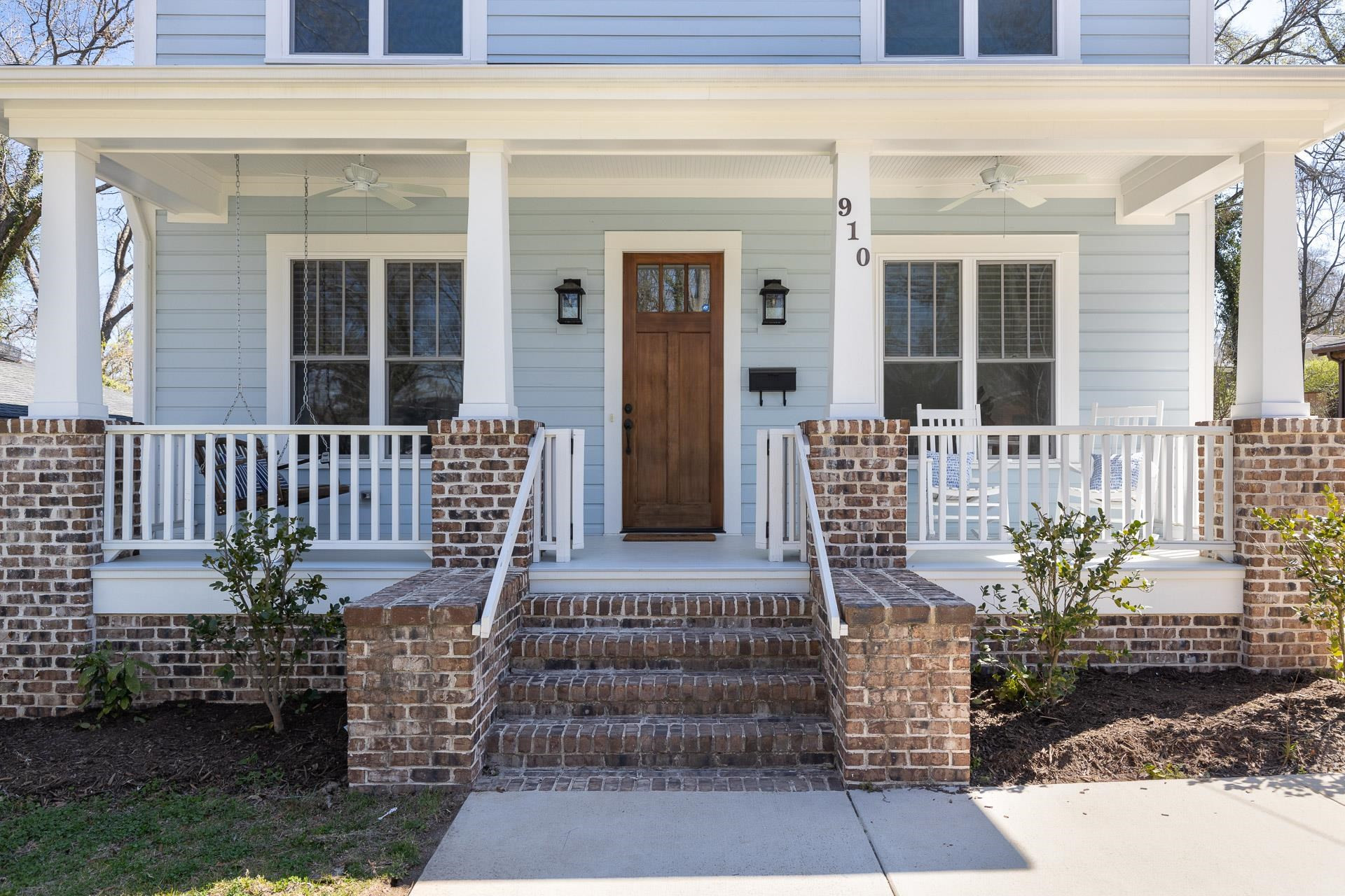 910 Sedgefield Street Durham, NC 27705 - Photo 2 of 39 a front view of a house with outdoor seating