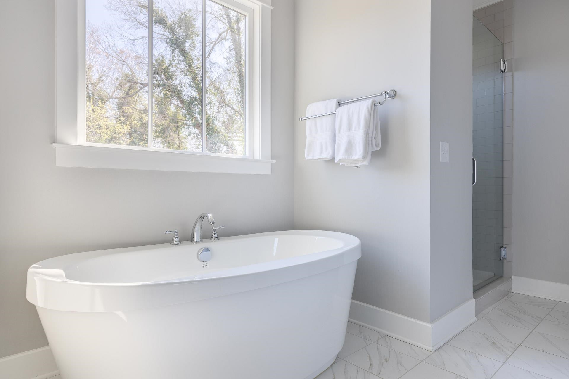 910 Sedgefield Street Durham, NC 27705 - Photo 24 of 39 a white bath tub sitting next to a white sink
