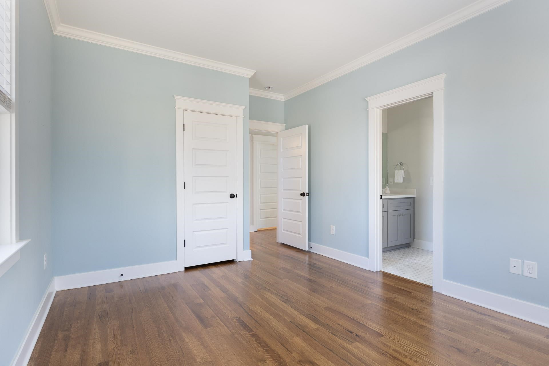 910 Sedgefield Street Durham, NC 27705 - Photo 32 of 39 an empty room with wooden floor & closet area