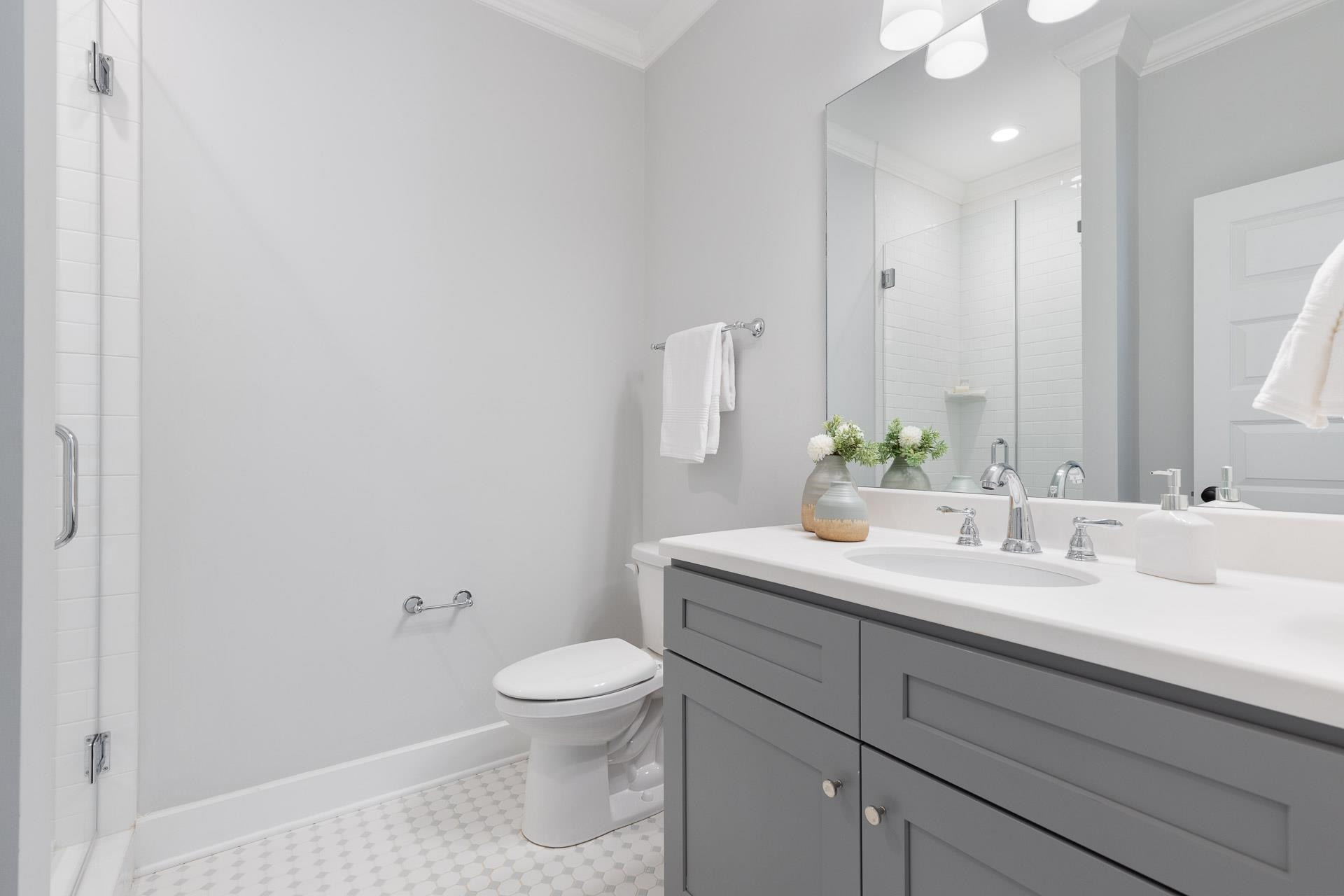910 Sedgefield Street Durham, NC 27705 - Photo 33 of 39 a bathroom with a sink a toilet and mirror