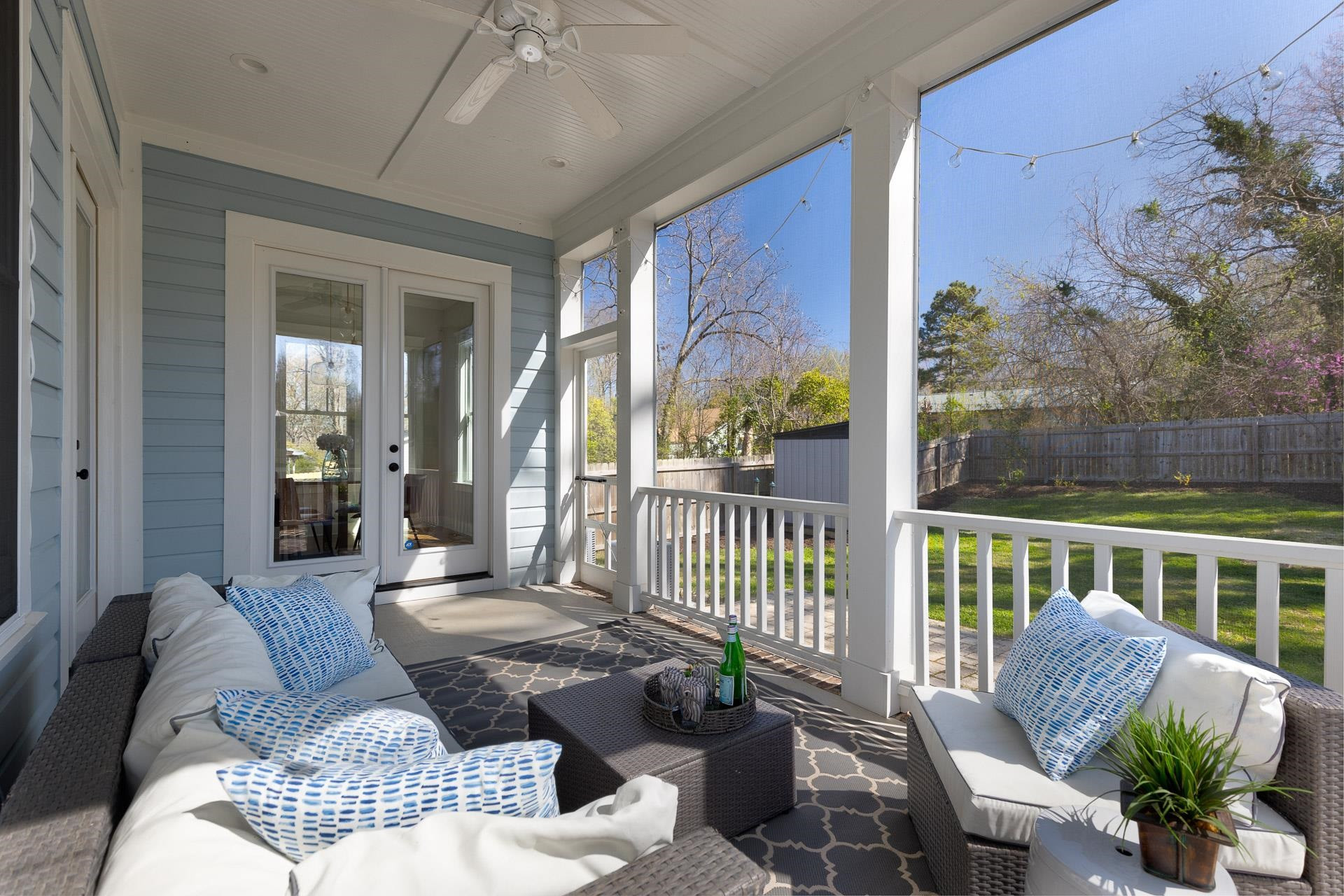 910 Sedgefield Street Durham, NC 27705 - Photo 36 of 39 a living room with furniture and a floor to ceiling window