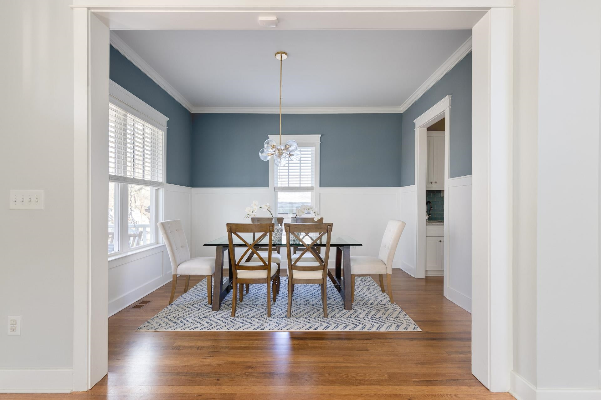 910 Sedgefield Street Durham, NC 27705 - Photo 6 of 39 a view of a dining room with furniture window and wooden floor