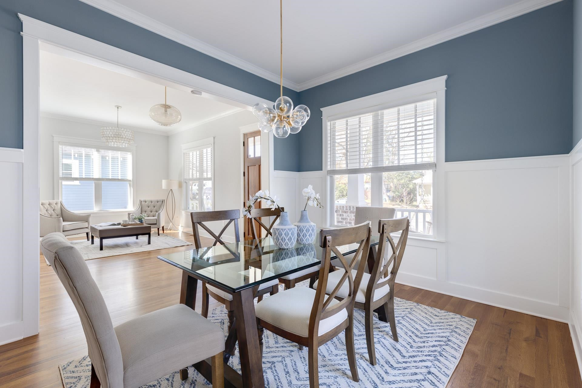 910 Sedgefield Street Durham, NC 27705 - Photo 7 of 39 a view of a dining room with furniture window and wooden floor