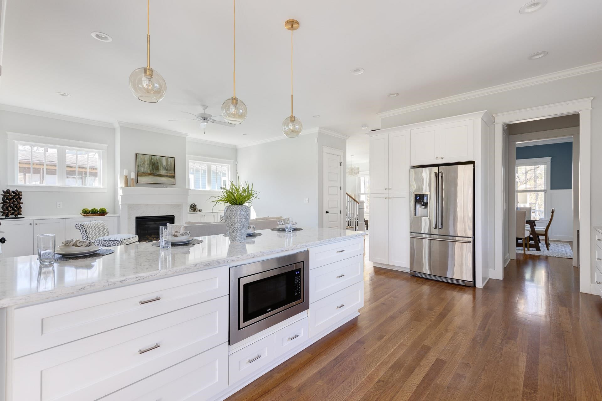 910 Sedgefield Street Durham, NC 27705 - Photo 10 of 39 a kitchen with stainless steel appliances a stove a sink and a refrigerator