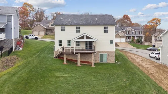 a view of swimming pool with seating space