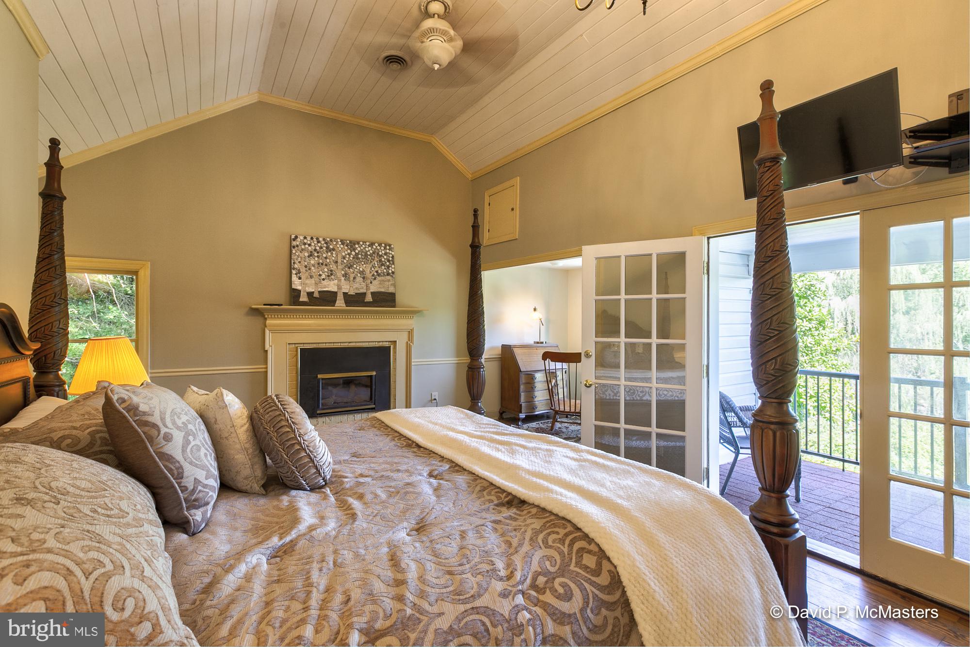 3632 Vineyard Road Falling Waters, WV 25419 - Photo 19 of 56 Master bedroom with fireplace and balcony