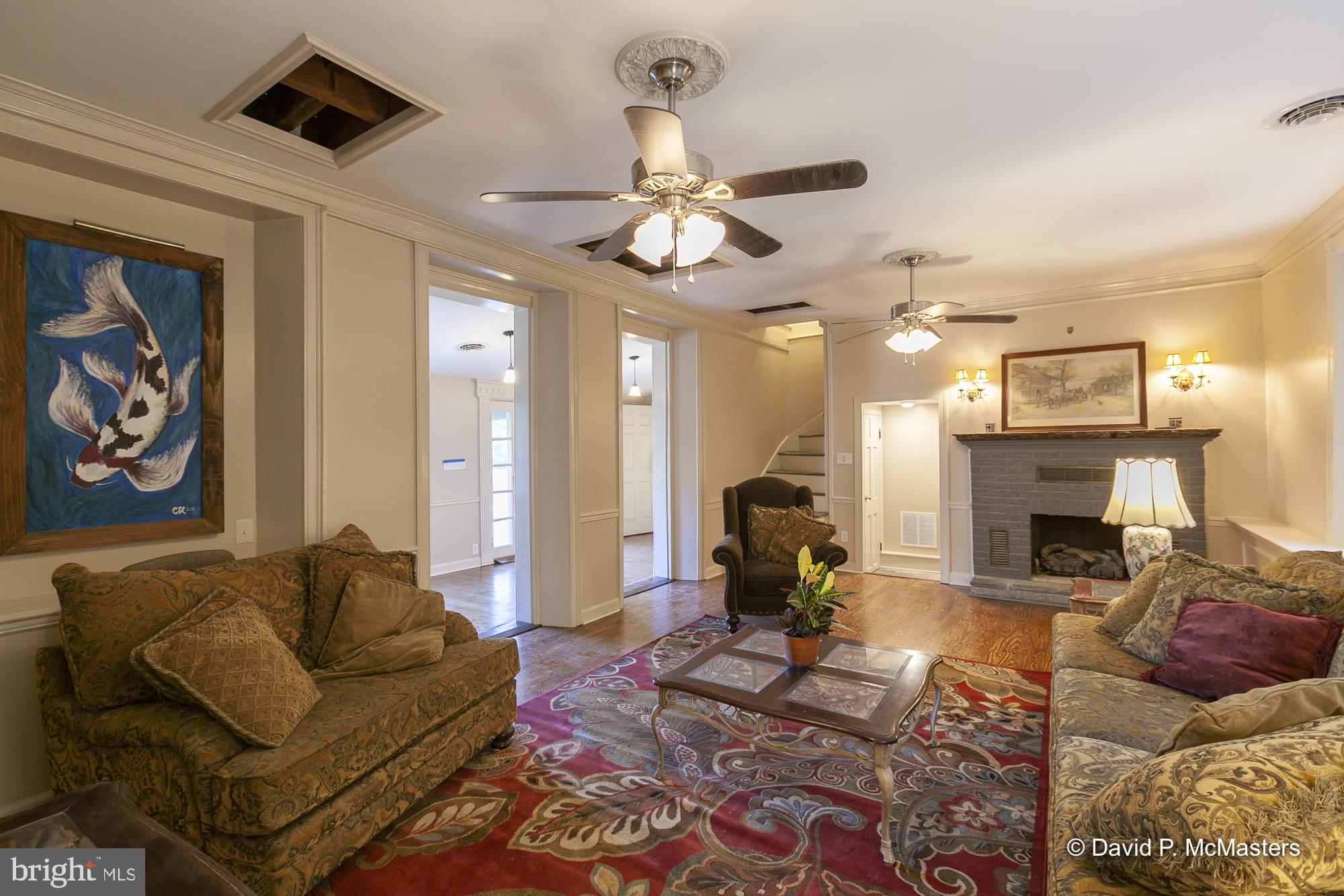 3632 Vineyard Road Falling Waters, WV 25419 - Photo 49 of 56 Parlor off entry foyer Gas log fireplace