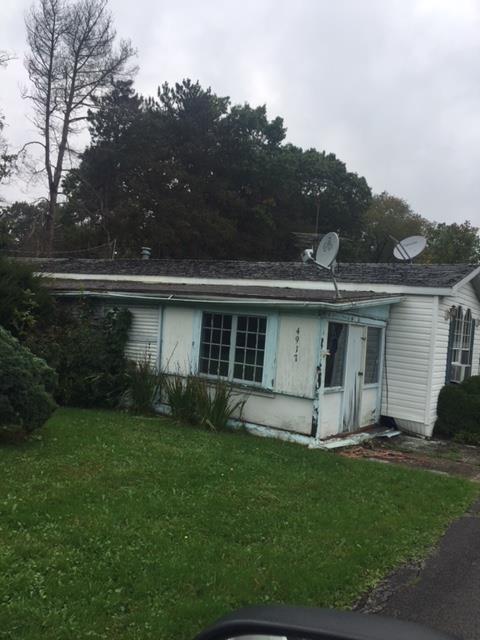 4917 Georgetown Road Franklin, PA 16323 - Photo 1 of 1 a view of a house with a yard and a garden