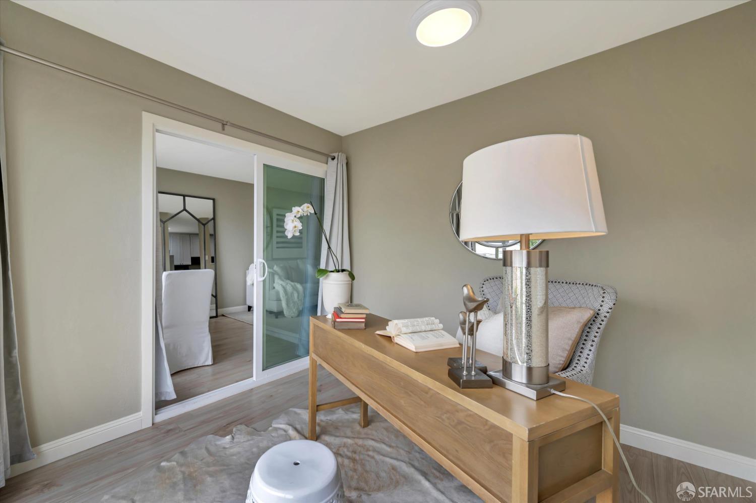 1585 10th Avenue, Unit 3 San Francisco, CA 94122 - Photo 16 of 32 a room with a table and chairs