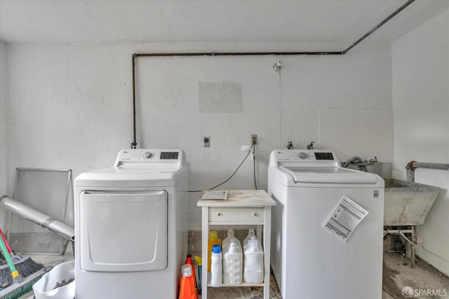 1585 10th Avenue, Unit 3 San Francisco, CA 94122 - Photo 28 of 32 a utility room with dryer and washer