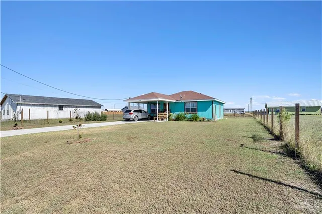 a view of a house with a patio