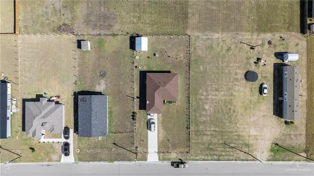 an aerial view of a city with ocean view