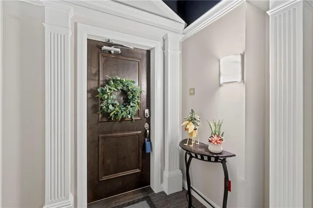 a view of a hallway and dining room