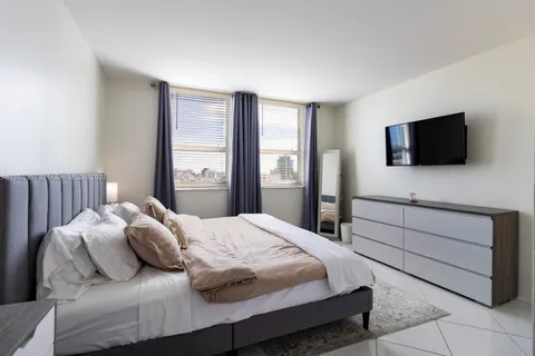 a view of a city with tall buildings