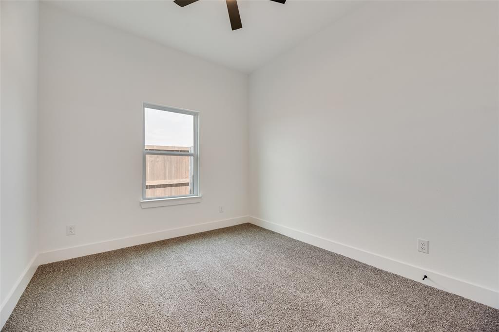 110 Hesed Street Greenville, TX 75402 - Photo 22 of 33 an empty room with a window