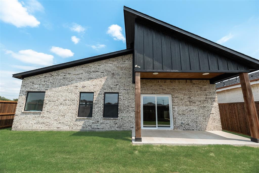 110 Hesed Street Greenville, TX 75402 - Photo 26 of 33 a front view of a house with a yard