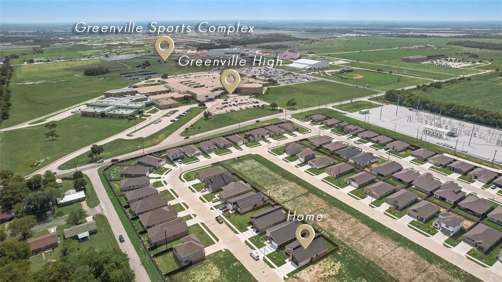 110 Hesed Street Greenville, TX 75402 - Photo 30 of 33 a view of a city with a lake