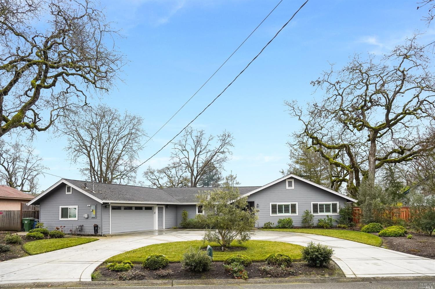 191 Oak Tree Drive Santa Rosa, CA 95401 - Photo 1 of 1 a front view of house with yard and green space