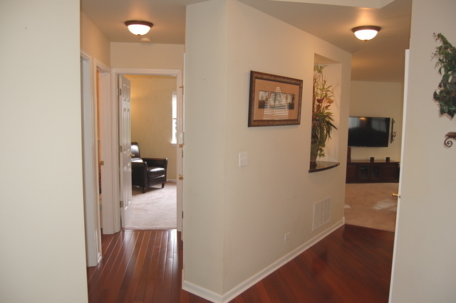 221 Ellis Road Lake In The Hills, IL 60156 - Photo 11 of 28 wooden floor in a gallery