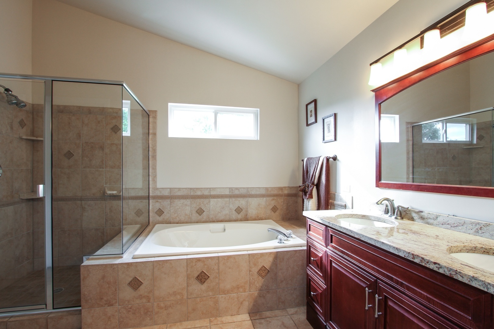 221 Ellis Road Lake In The Hills, IL 60156 - Photo 16 of 28 a bathroom with a bathtub and a sink