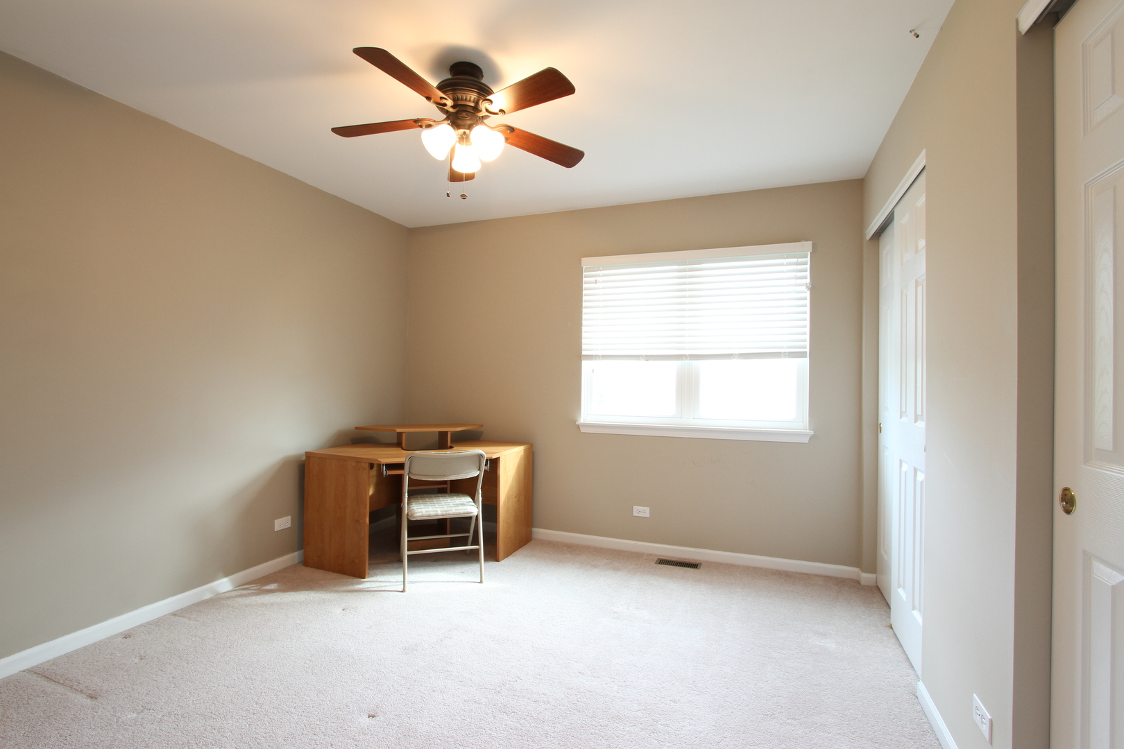 221 Ellis Road Lake In The Hills, IL 60156 - Photo 19 of 28 an empty room with a window
