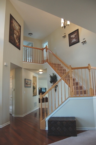 221 Ellis Road Lake In The Hills, IL 60156 - Photo 21 of 28 a view of entryway and hall with wooden floor