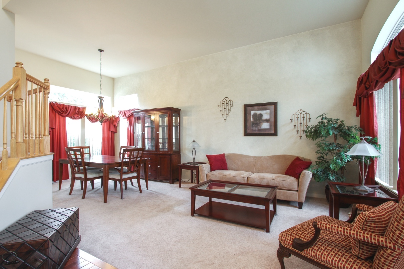 221 Ellis Road Lake In The Hills, IL 60156 - Photo 4 of 28 a living room with furniture and a chandelier