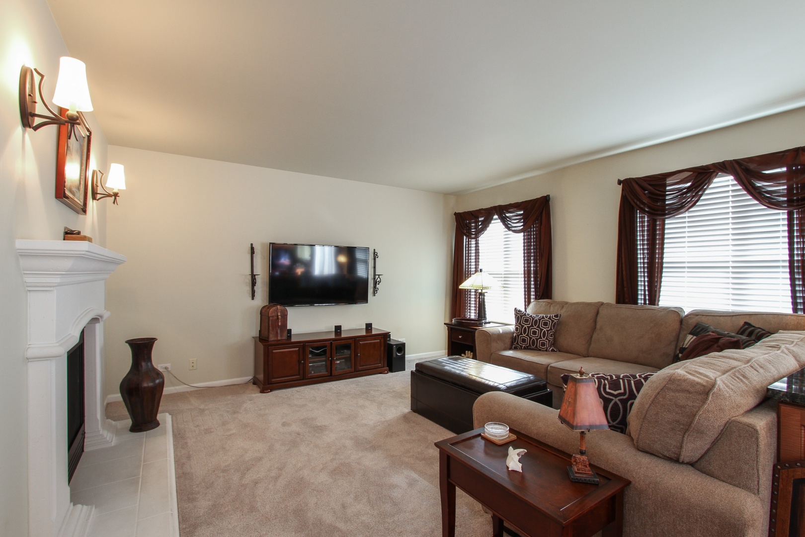 221 Ellis Road Lake In The Hills, IL 60156 - Photo 7 of 28 a living room with furniture and a flat screen tv