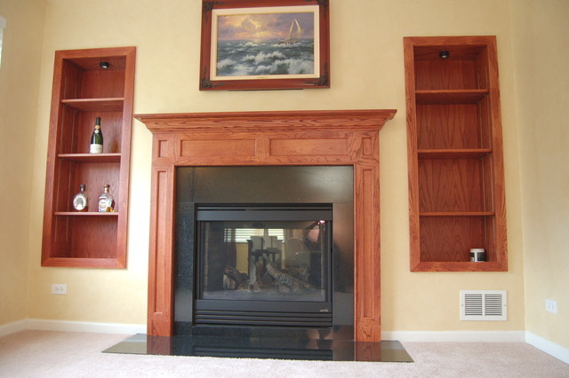 221 Ellis Road Lake In The Hills, IL 60156 - Photo 9 of 28 a view of a livingroom with an empty space and a fireplace