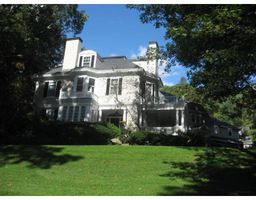 78 Abbott Road Wellesley, MA 02481 - Photo 1 of 23 a front view of a house with garden