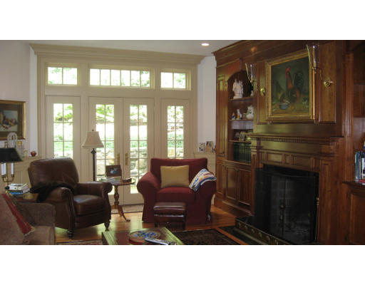 78 Abbott Road Wellesley, MA 02481 - Photo 6 of 23 a living room with furniture and a fireplace