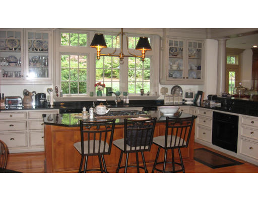 78 Abbott Road Wellesley, MA 02481 - Photo 10 of 23 a kitchen view with a dining table chairs and window