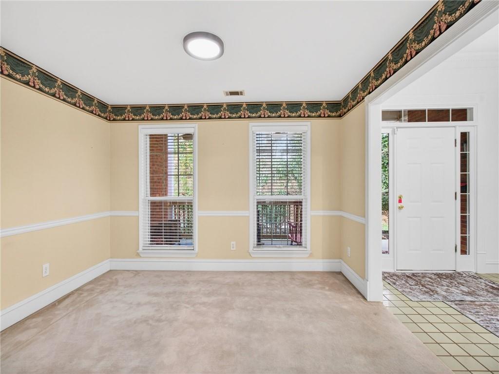 2038 Buford Dam Road Buford, GA 30518 - Photo 15 of 56 a view of a livingroom with a staircase