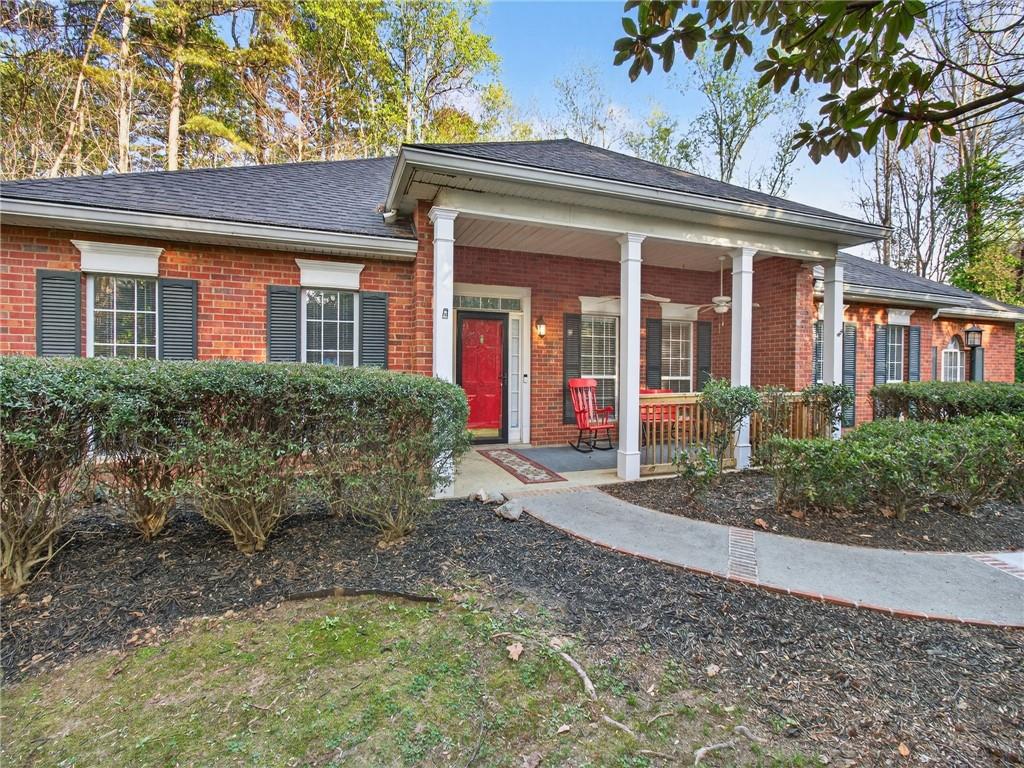 2038 Buford Dam Road Buford, GA 30518 - Photo 2 of 56 front view of a house