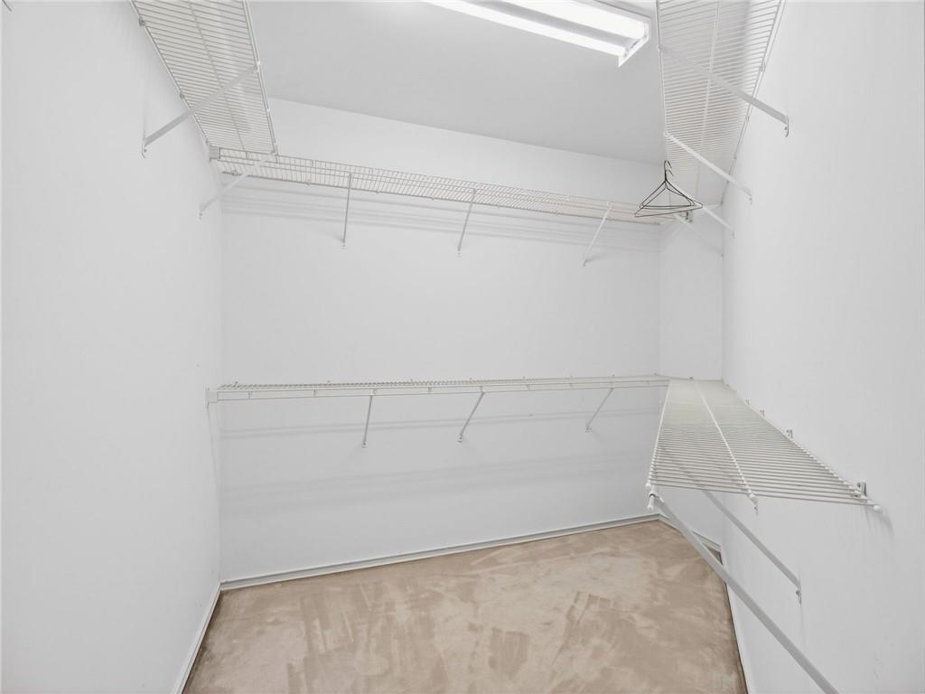 2038 Buford Dam Road Buford, GA 30518 - Photo 33 of 56 a view of a room with racks on the wall