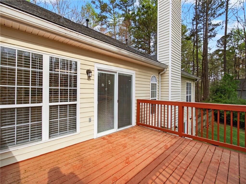 2038 Buford Dam Road Buford, GA 30518 - Photo 49 of 56 a view of a house with a roof deck