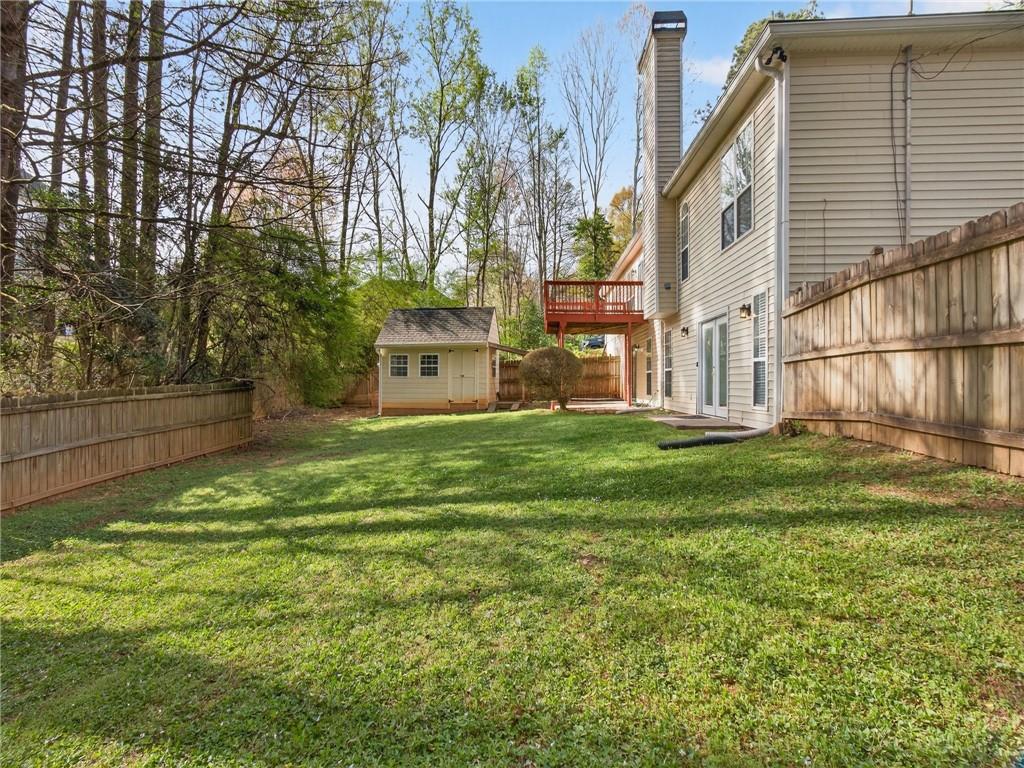 2038 Buford Dam Road Buford, GA 30518 - Photo 52 of 56 a view of a back yard