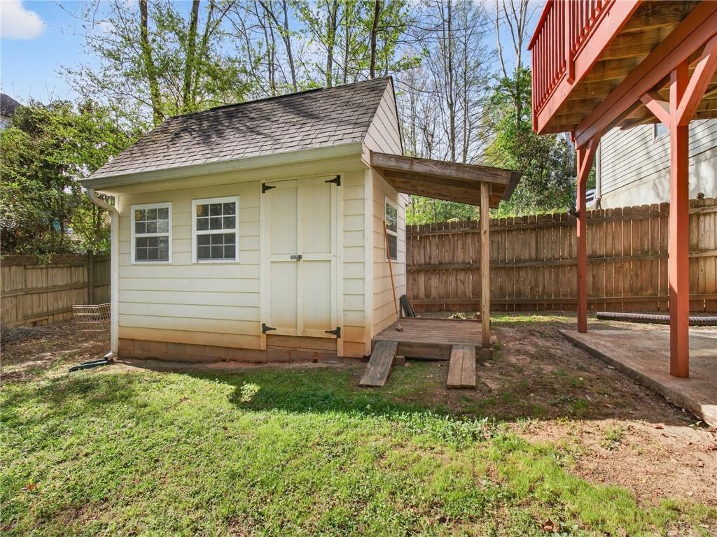 2038 Buford Dam Road Buford, GA 30518 - Photo 53 of 56 a view of a house with backyard and sitting area