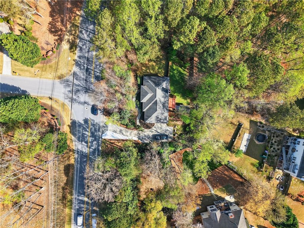 2038 Buford Dam Road Buford, GA 30518 - Photo 8 of 56 a backyard of a house with lots of green space