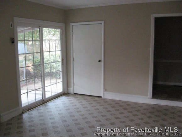 225 Cecil Avenue Spring Lake, NC 28390 - Photo 17 of 24 a view of empty room with sliding door