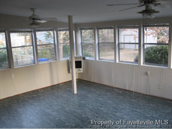 225 Cecil Avenue Spring Lake, NC 28390 - Photo 18 of 24 an empty room with windows