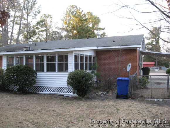 225 Cecil Avenue Spring Lake, NC 28390 - Photo 24 of 24 a front view of a house with garden