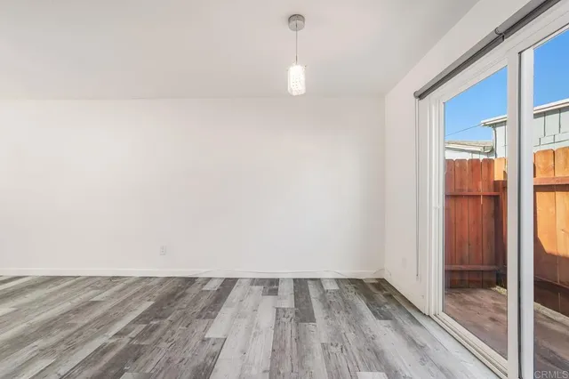 a kitchen with a sink cabinets and window