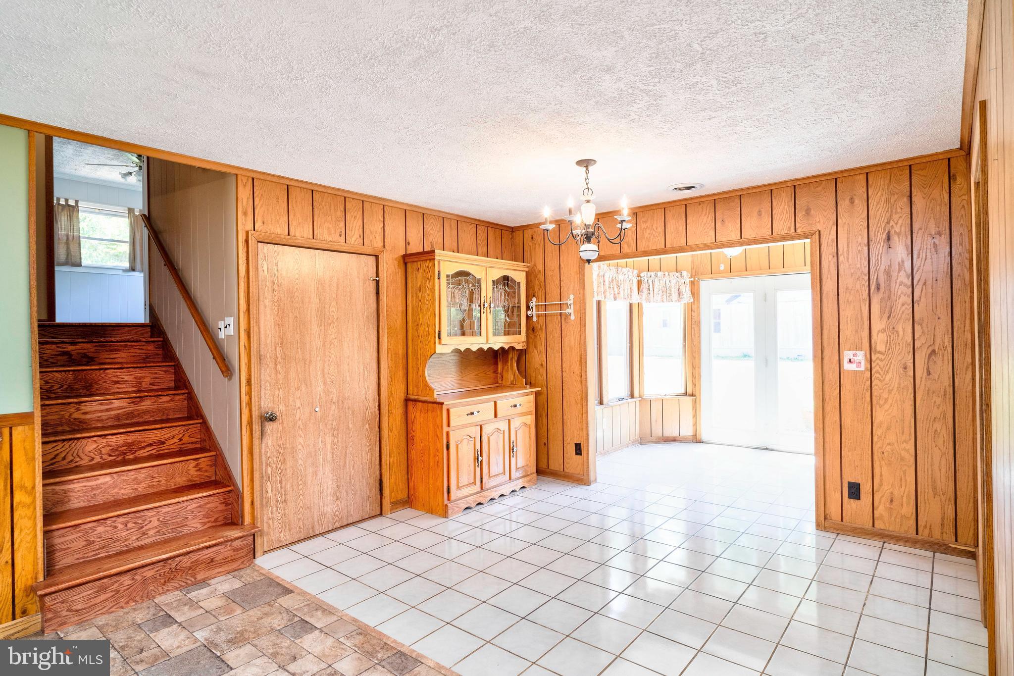 28484 Raccoon Ford Road Burr Hill, VA 22433 - Photo 13 of 48 Dining room off great room - stairs to BR's & down