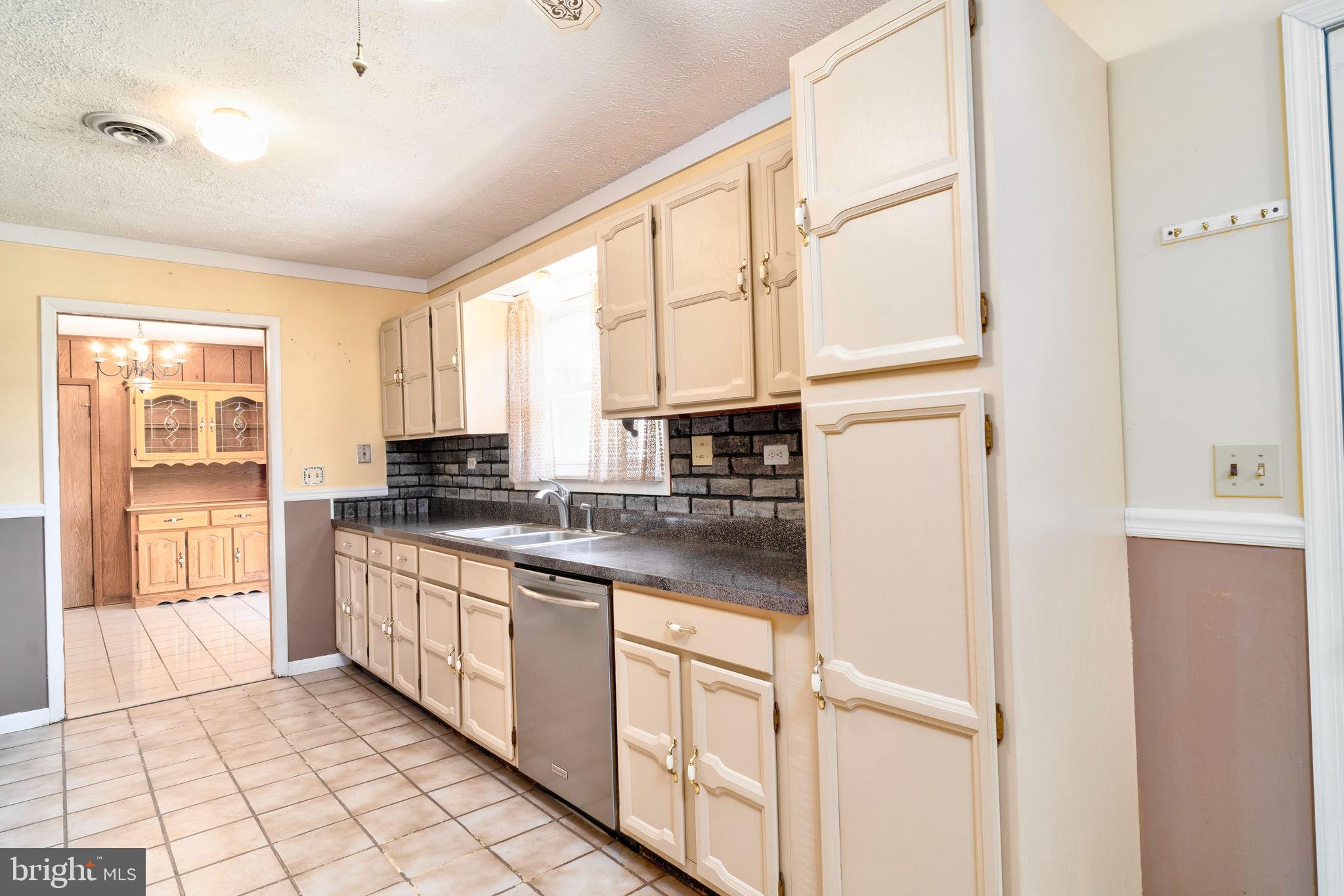 28484 Raccoon Ford Road Burr Hill, VA 22433 - Photo 18 of 48 Kitchen looking toward dining & sun room