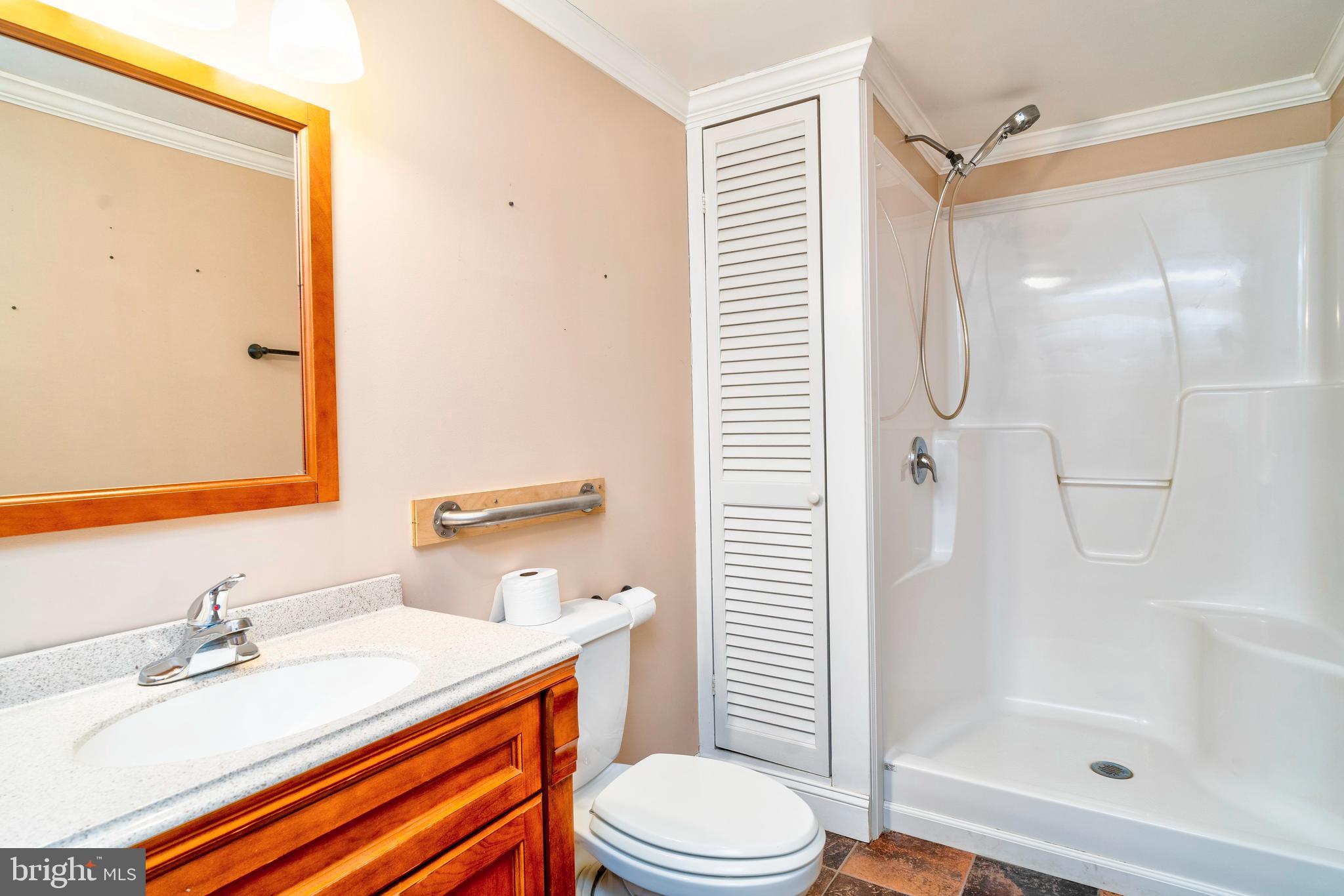 28484 Raccoon Ford Road Burr Hill, VA 22433 - Photo 21 of 48 2nd bathroom is on main level behind laundry area.
