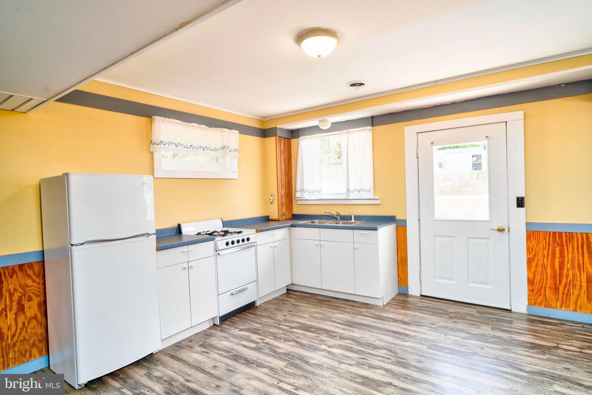 28484 Raccoon Ford Road Burr Hill, VA 22433 - Photo 23 of 48 Kitchen in LL w/door to its own patio area