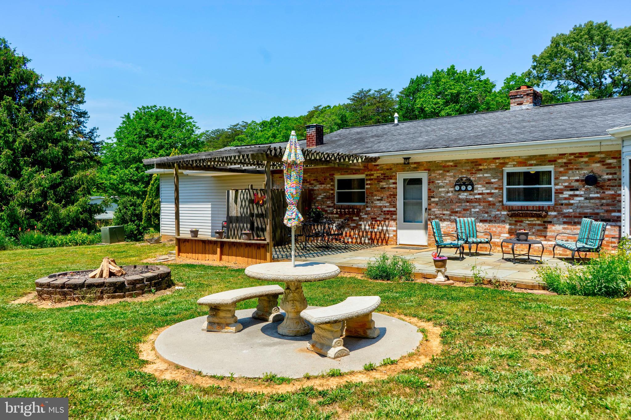 Concrete picnic table at sitting area can convey