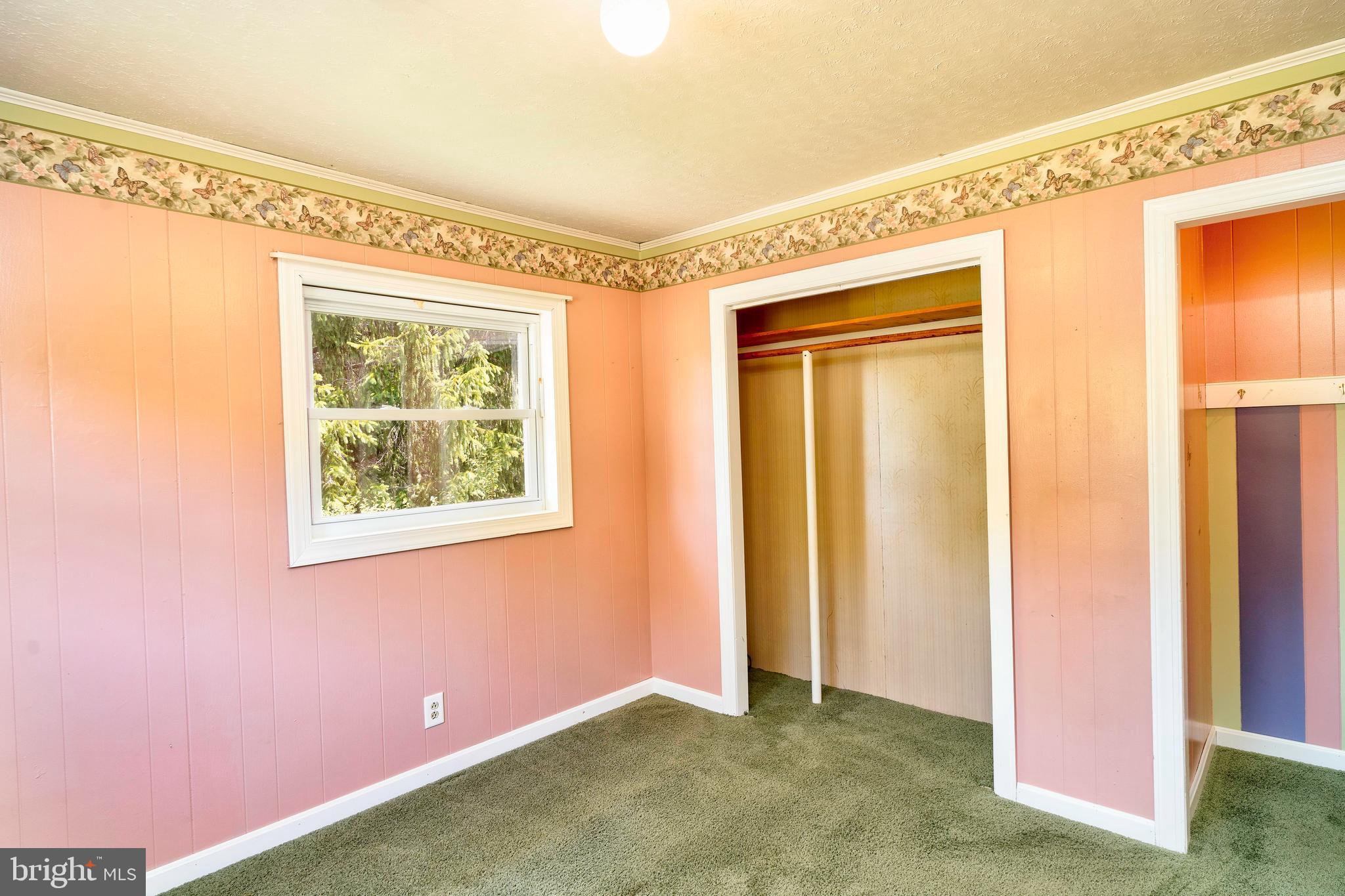 28484 Raccoon Ford Road Burr Hill, VA 22433 - Photo 32 of 48 Bedroom #2 closet doors are in the garage